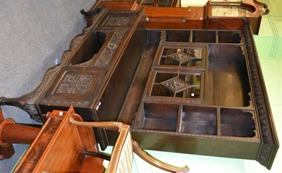 Lot 1417 - A large early 20th century stained oak dresser and rack with carved portrait plaques of Anne...