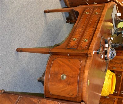 Lot 1423 - A reproduction mahogany bow front sideboard