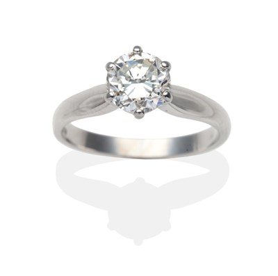 Lot 300 - An 18 Carat White Gold Diamond Solitaire Ring, a round brilliant cut diamond in a claw setting...