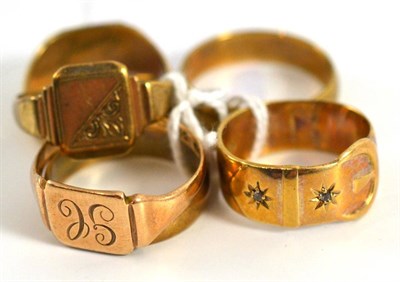 Lot 5014 - Two 9ct gold band rings, three 9ct gold signet rings and a buckle ring