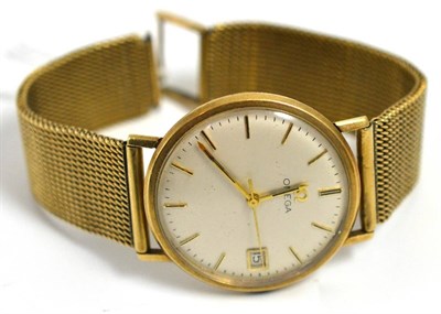 Lot 5017 - A gents 9ct gold wristwatch signed Omega, with a 9ct gold bracelet