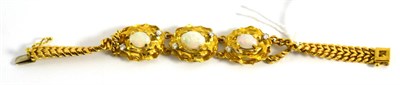 Lot 5051 - An opal and diamond set bracelet