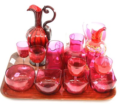 Lot 5062 - A tray of assorted cranberry glass including two ewers