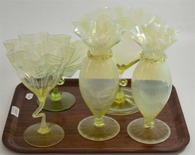 Lot 5067 - Vaseline glass comprising: a pair of vases with crimped rims, two spill vases with spiral stems and