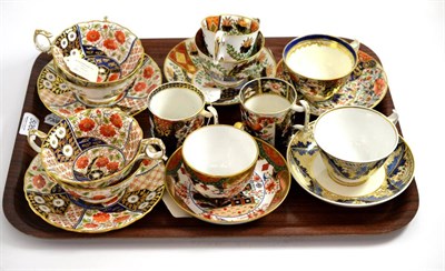 Lot 5069 - A collection of 19th century English porcelain tea cups and saucers decorated in the Imari style