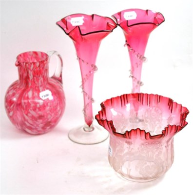 Lot 5086 - A pair of cranberry glass trumpet vases, a ewer and a cranberry glass oil lamp shade