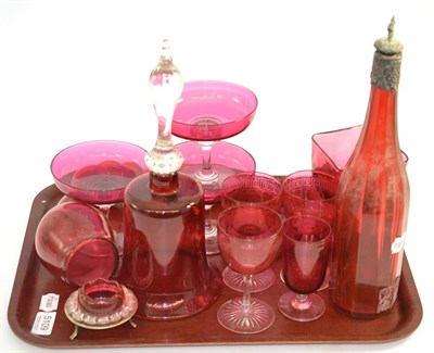 Lot 5109 - A tray of cranberry glass including a pipe, a bell and a decanter