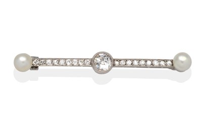 Lot 319 - A Diamond and Pearl Bar Brooch, a central old cut diamond in a white milgrain setting to an...