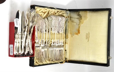 Lot 5135 - A quantity of mostly Continental silver cased flatware and a set of silver plated fish knives...