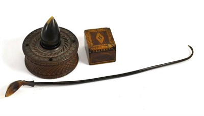 Lot 5137 - A 19th century diaper carved treen inkwell; a 19th century polished horn ladle; a 19th century horn