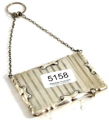 Lot 5158 - A silver card case with a purse style suspension chain, Levi and Salaman Chester 1913