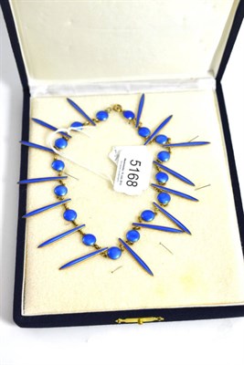 Lot 5168 - A blue enamelled necklace, by David Andersen, round discs alternate with spikes, enamelled in...