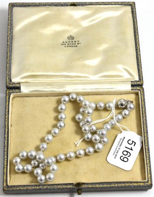 Lot 5169 - A strand of silvery-grey cultured pearls, with a ball clasp stamped '18K 750'