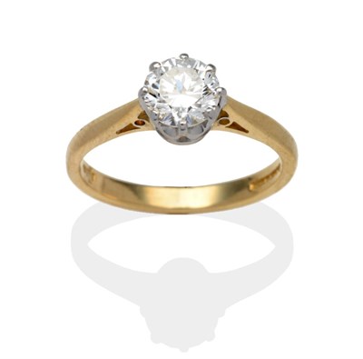 Lot 333 - An 18 Carat Gold Diamond Solitaire Ring, a round brilliant cut diamond in a white claw setting...