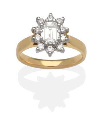 Lot 335 - An 18 Carat Gold Diamond Cluster Ring, an octagonal cut diamond within a border of round...