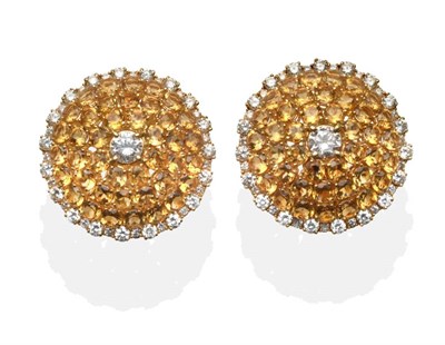 Lot 341 - A Pair of Diamond and Citrine Cluster Earrings , a round brilliant cut diamond in a yellow claw...