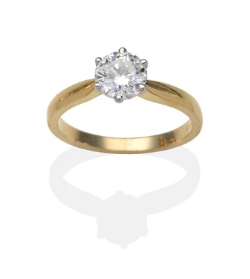 Lot 342 - An 18 Carat Gold Diamond Solitaire Ring, a round brilliant cut diamond in a white claw setting...