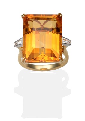 Lot 343 - An 18 Carat Gold Citrine and Diamond Ring, an octagonal cut citrine in a yellow claw setting,...