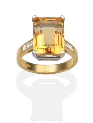 Lot 349 - An 18 Carat Gold Citrine and Diamond Ring, an octagonal cut citrine in a white claw setting, to...