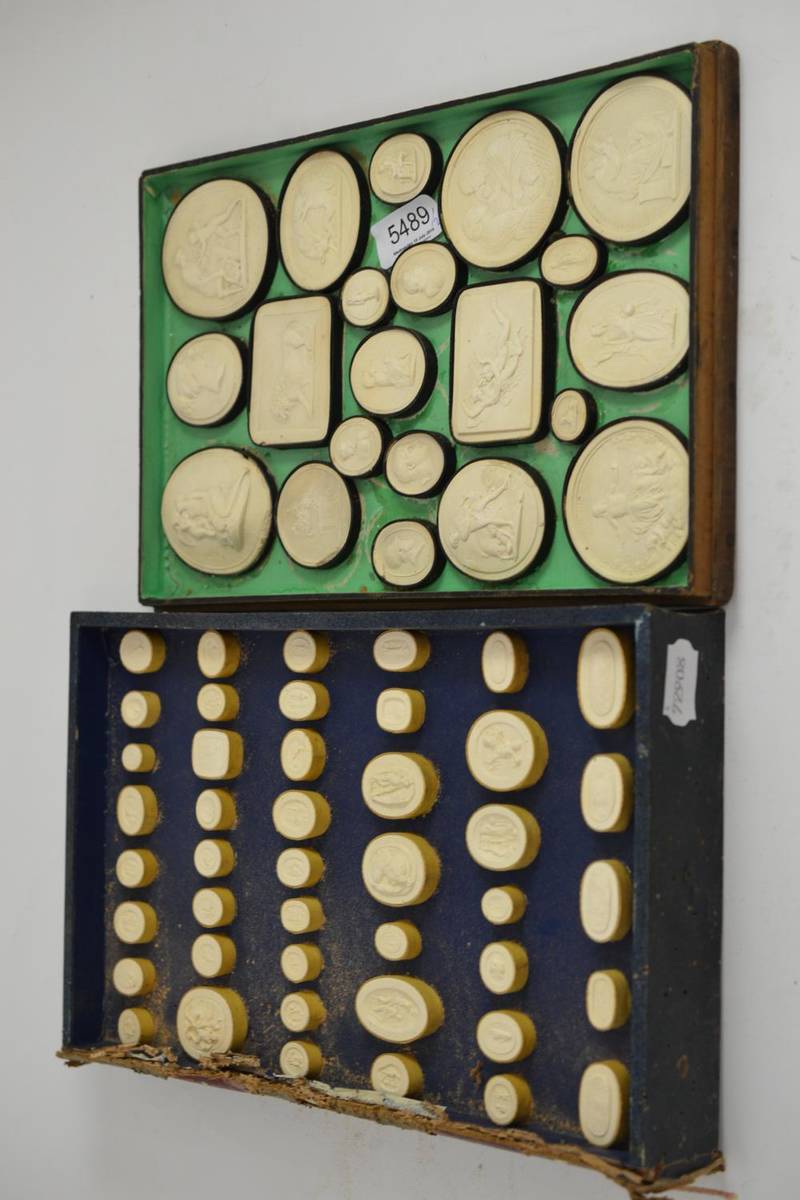 Lot 5489 - Two albums of plaster intaglios
