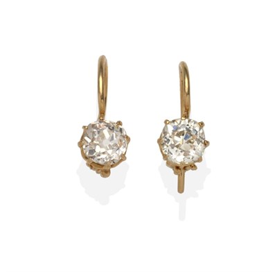 Lot 386 - A Pair of Diamond Solitaire Earrings, an old cut diamond in a yellow claw setting, with hook...