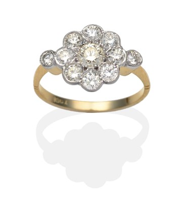 Lot 392 - A Diamond Cluster Ring, a round brilliant cut diamond within a border of smaller round...