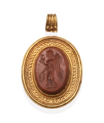 Lot 404 - A Roman Jasper Intaglio Pendant, depicting Nike, the oval intaglio in a later cannetille frame,...