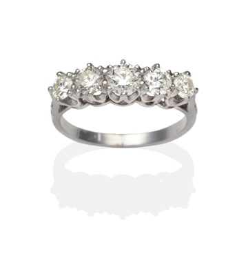 Lot 419 - A Diamond Five Stone Ring, graduated round brilliant cut diamonds in white claw settings, to...