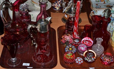 Lot 8 - Two trays of cranberry glass, decanters and paperweights