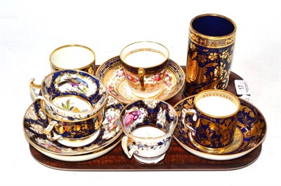 Lot 17 - A tray including 19th century cups and saucers and a spill vase