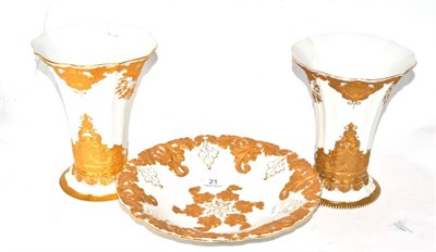 Lot 21 - Pair of gilt decorated Meissen porcelain trumpet vases and a similarly decorated plate