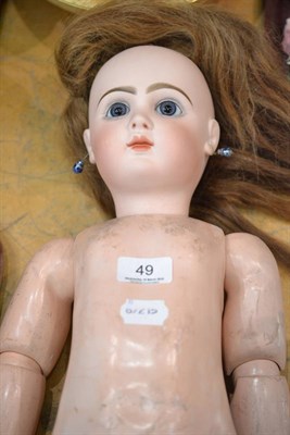 Lot 49 - Jumeau bisque socket head doll, with piercing fixed blue eyes, original wig, pierced ears,...