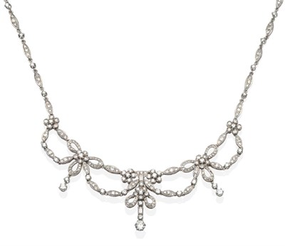 Lot 431 - A Diamond Necklace, the front with floral swags set throughout with round brilliant cut and...