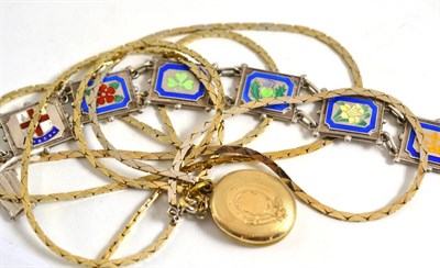 Lot 57 - A gold locket on gilt chain, another chain and a silver enamel bracelet