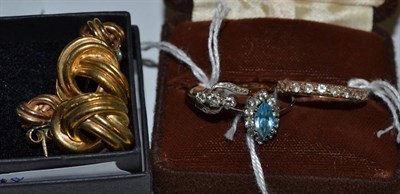 Lot 71 - A three stone diamond ring and two dress rings; together with a pair of 9ct gold knot earrings...