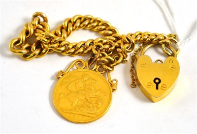Lot 77 - A 1908 sovereign on chain with padlock