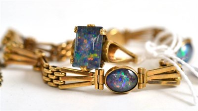 Lot 95 - An opal triplet ring, stamped '10K' and an opal triplet set gate bracelet stamped '9CT' (2)