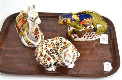 Lot 104 - Three Royal Crown Derby animal figures - chameleon, lama and a bear