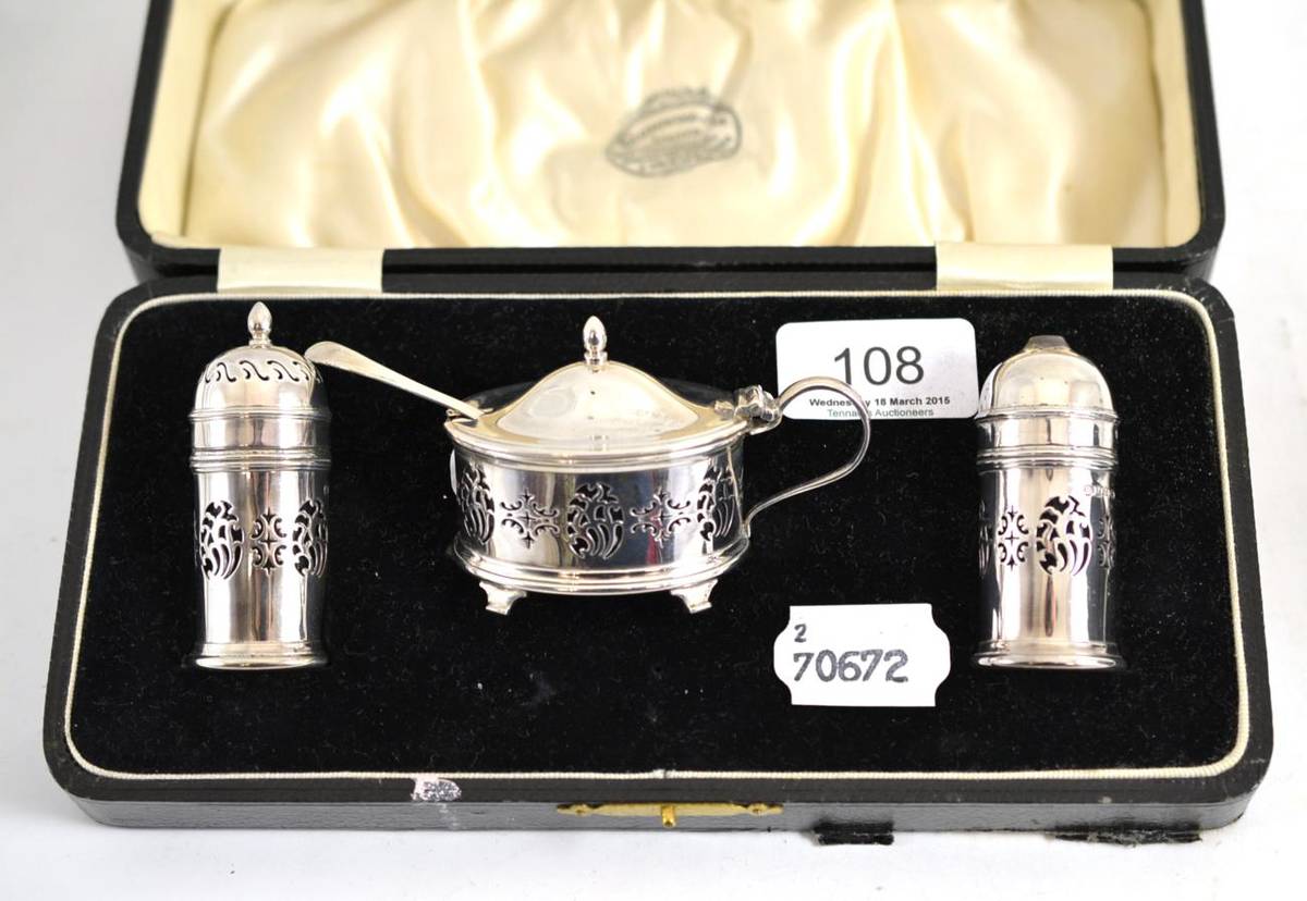 Lot 108 - A cased set of silver salt and peppers