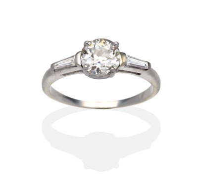 Lot 443 - A Diamond Solitaire Ring, an old cut diamond in a white claw setting with shoulders each set with a