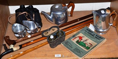 Lot 137 - Four assorted walking sticks, Picquot ware tea wares, binoculars, two volumes Albert and others etc