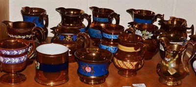 Lot 139 - A shelf of copper lustre ware, jugs, mugs, etc, one jug depicting ";The Little Jockey"
