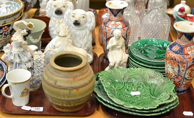 Lot 148 - Pair of Imari vases, pair of Staffordshire dogs, various green glaze pottery plates, Wedgwood green