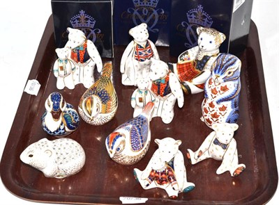 Lot 164 - A collection of eleven Royal Crown Derby china paperweights including three original boxes