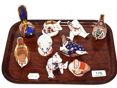 Lot 176 - A collection of nine Royal Crown Derby china paperweights