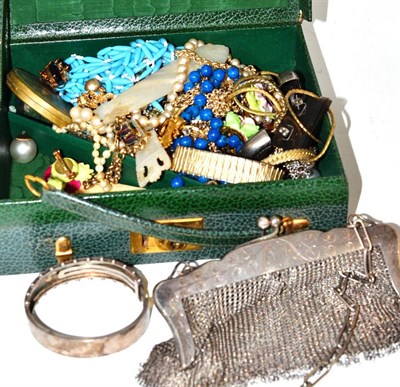 Lot 193 - Green leather jewellery box enclosing a hinged silver bangle, mesh purse stamped '925', costume...
