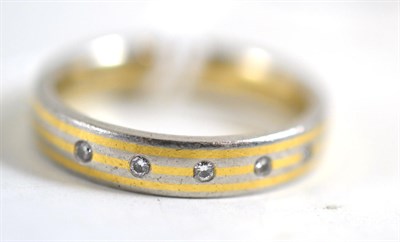 Lot 207 - A platinum and gold diamond set ring, stamped 'PT950' and '750' for platinum and 18ct gold