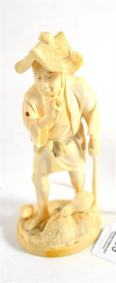 Lot 209 - A late 19th century Japanese ivory okimono