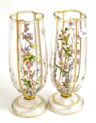 Lot 213 - A pair of Continental glass vases with enamelled flowers and gilt highlights