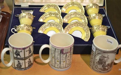 Lot 227 - A cased Aynsley china tea set with enamel and silver spoons and three Wedgwood mugs